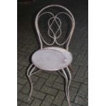 A set of four contemporary French style wrought metal panelled seat cafe chairsCondition report: