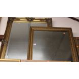 A modern gilt framed and bevelled rectangular wall mirror, 100 x 82cm; and one other smaller example