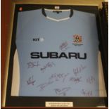 A framed and signed Coventry City football shirt, from the 2004-05 season commemorating their last