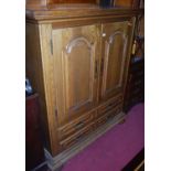 A modern Belgian oak double door side cupboard, with twin long lower drawers, width 130cm,