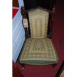 A Victorian mahogany and embroidered nursing chair, together with a further Edwardian mahogany