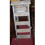 An early 20th century pine five-tread decorators ladder