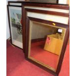 An oak framed wall mirror, two stagecoach prints, and a pair of Terence Cuneo ceremonial prints