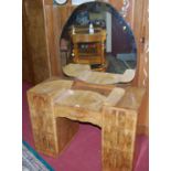 An Art Deco figured walnut kneehole mirror back dressing table, width 104cm