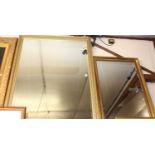 A reproduction gilt framed and bevelled rectangular wall mirror, 126 x 100cm; and one other
