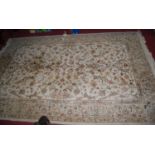A Persian style machine woven cream ground Tabriz rug, 265 x 174cm