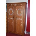 A French hardwood and floral painted double door armoire, width 127cm