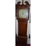 An early 19th century oak and mahogany crossbanded longcase clock, the square painted dial signed