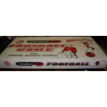 A boxed International Football game by Monroe Games; and a wooden football pitch (2)