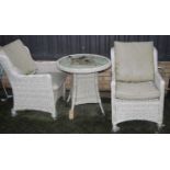 A contemporary wicker circular conservatory table, together with two matching armchairs (3)Condition
