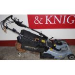 A Weibang Briggs & Stratton petrol driven lawnmower with grass collecting box
