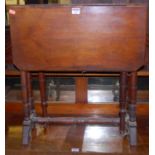 An Edwardian walnut Sutherland table