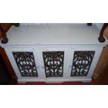 A contemporary painted hardwood three door side cabinet, width 133cm, together with a painted