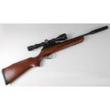 * A B.S.A. .177 break barrel air rifle with sound moderator and Japanese scope, serial number AR