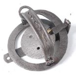 * An early 20th century pole trap, having 4 1/2" domed serrated jaws, the spring neck stamped E.