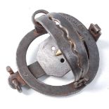 * A Victorian pole trap, having 4" serrated jaws and diamond shaped brass tongue, stamped J.