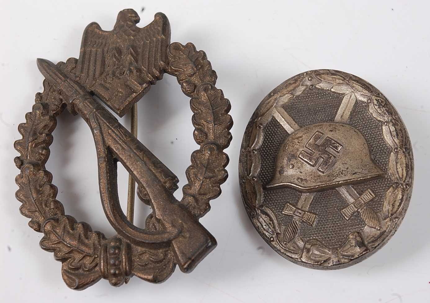 A German Third Reich Infantry Assault badge with pin back and marked FLL for Friedrich Linden,