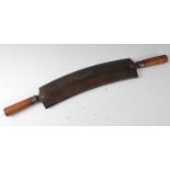 * A Victorian Spear & Jackson tanners fleshing knife, having a 44cm double edged steel blade and