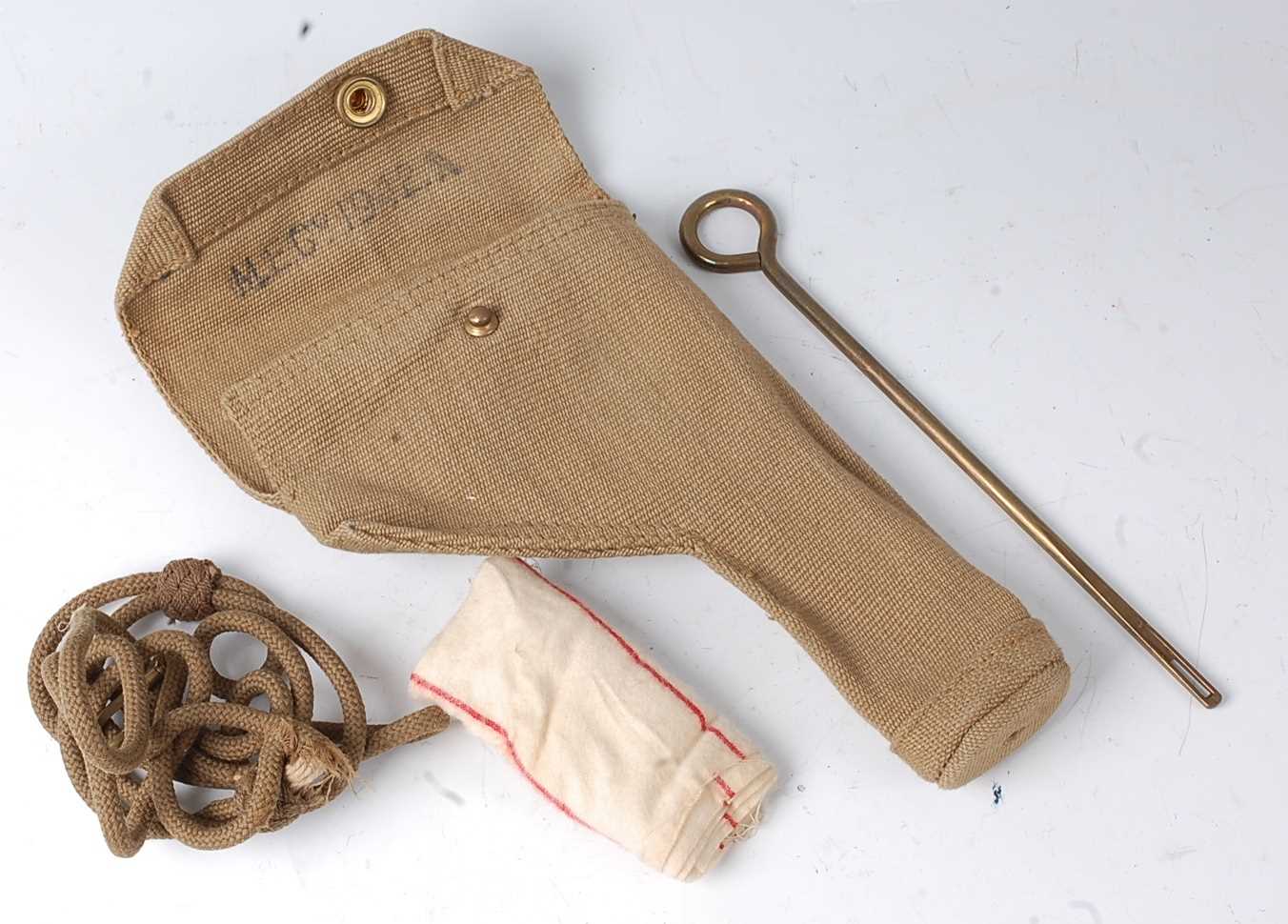 A British 1937 pattern webbing holster, stamped M.E. Co. and dated 1942.