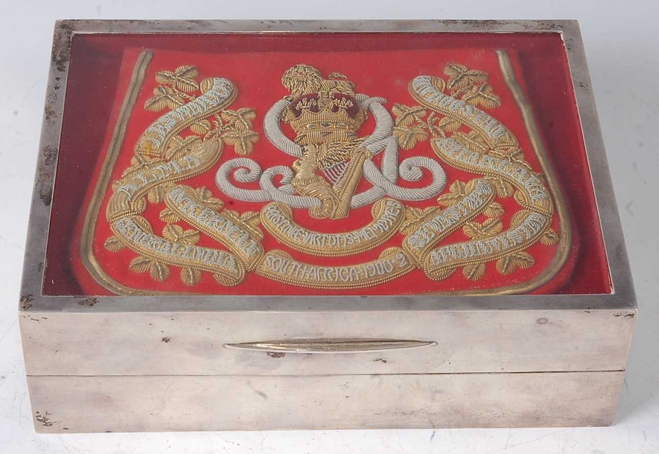 A George VI silver table cigar box of typical rectangular form, the hinged lid having an inset red