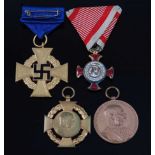 A German Civil Service 40 year Faithful Service medal, together with an Austrian Franz Joseph
