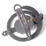 * An early 20th century Sidebotham pole trap, having 5" serrated domed jaws, the spring neck stamped