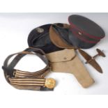 A WW II webbing holster, marked B Ltd and dated 1943, together with a Gieves gold braid naval belt