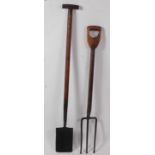 * An early 20th century rabbiting spade, having a typical rectangular blade and ash shaft with T