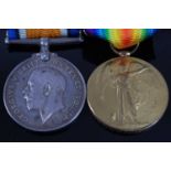 A WW I British War and Victory pair, naming 61645. CPL. A.C. FOWLES. W. YORKS. R. (2)