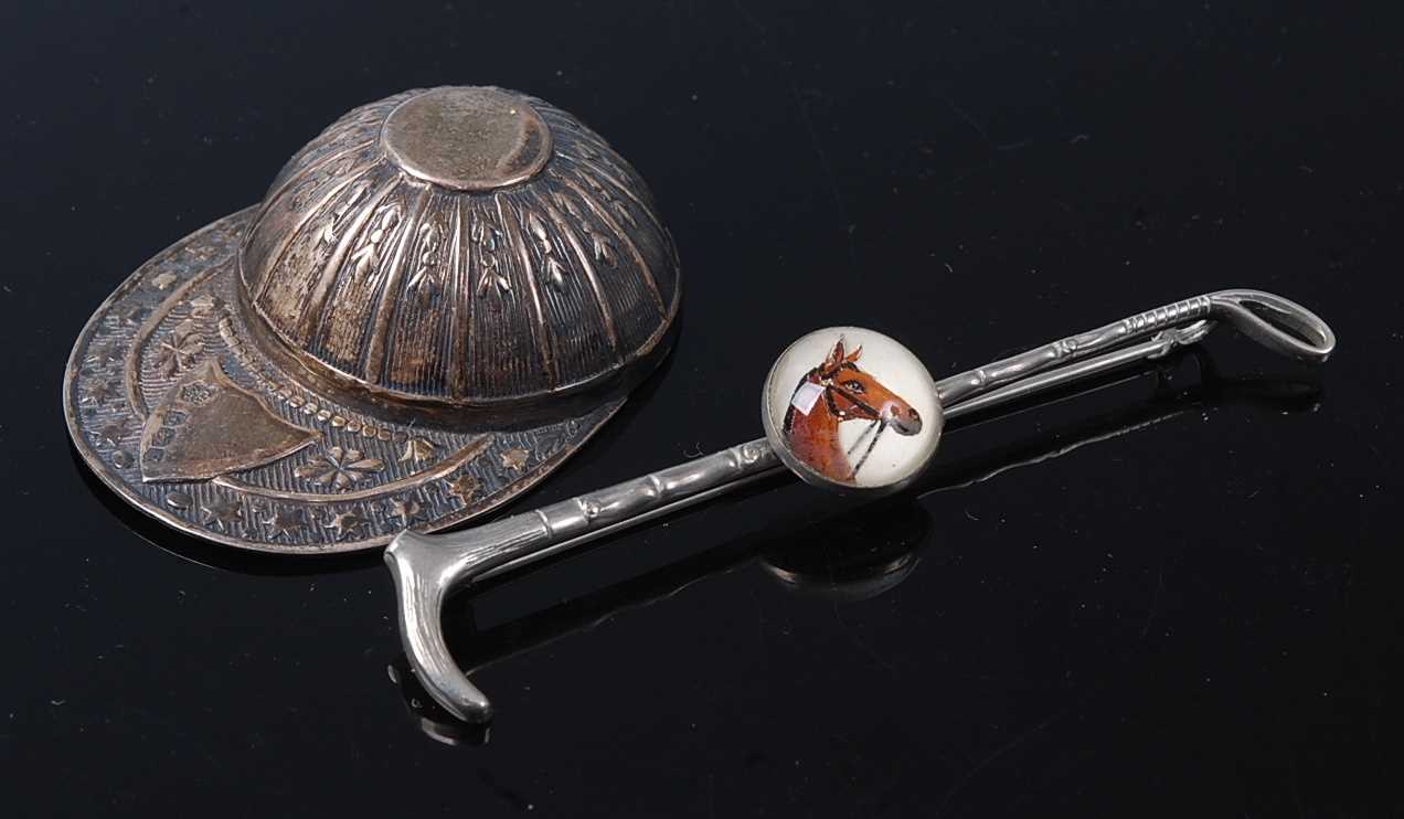A mid-20th century silver novelty tea caddy spoon in the form of a jockeys cap, Thomas Bradbury &
