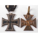 An Imperial German 1914 Iron Cross 2nd class, stamped 800 to the suspension loop, together with a