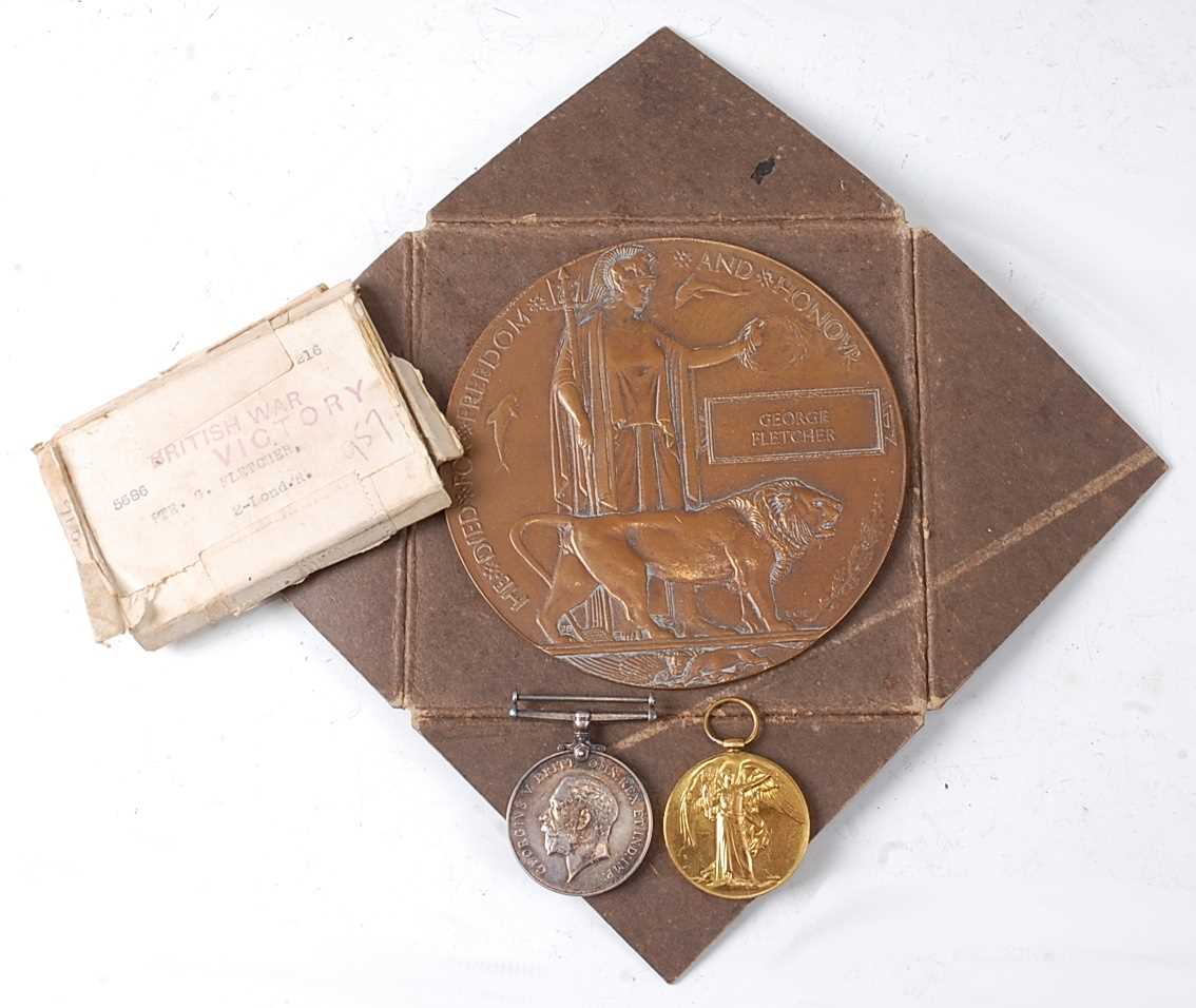 A WW I Casualty group to include a bronze memorial plaque, naming George Fletcher, in envelope