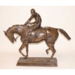 A large contemporary bronze model of a racehorse and jockey on a naturalistic base, w.114, d.24, h.