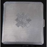 A WW II silver pocket cigarette case of hinged square form, having engine turned decoration and