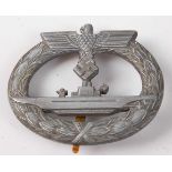 A German Third Reich Kriegsmarine U-boat war badge, with remains of gilt and vertical pin back,