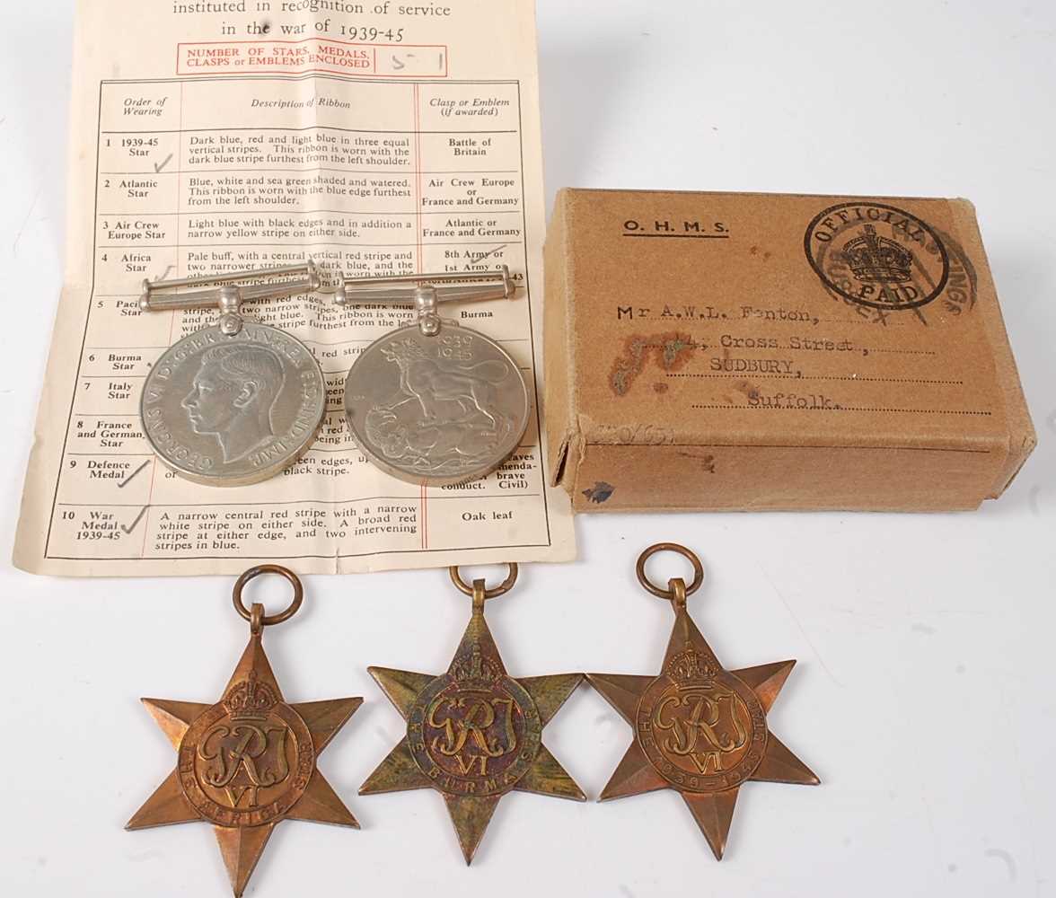 A group of five WW II medals, to include 1939-1945 Star, Africa Star, Burma Star, Defence and War,