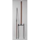 * An early 20th century iron thatcher's hod, 202cm, together with a thatcher's needle, 171cm. (2)