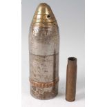 A deactivated WW I pom pom artillery shell, the nose cone with Arabic script, reputedly from the