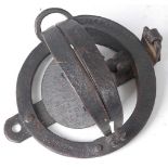 * An early 20th century pole trap, having 3 3/4" smooth jaws, stamped to the spring neck P & R