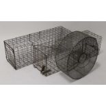 * A pair of Coypu wirework live catch traps, w.87cm; together with a 'Gilpa' circular rat /