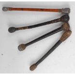* An early 20th century double ended hunting priest, having strung weighted ends and plaited