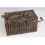 * An early 20th century mouse / rat cage, of slatted tin construction, circa 1930, w.39cmCondition