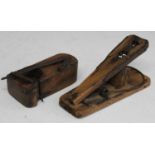 * A 19th century beech and iron 'guillotine' type mousetrap, 12cm; together with a 19th century pine