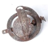* An early 20th century pole trap, having 3 1/2 domed serrated jaws, the spring neck stamped S.