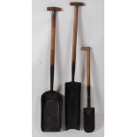 * A railway fireman's shovel, the shaft stamped English Tools Ltd, Wigan & Leeds Bulldog, Made in