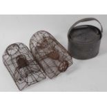 * A matched pair of Henri Marty wirework cage traps, w.40cm; together with a galvanised live bait