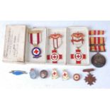 A British Red Cross Society enamelled breast badge, naming 31725 R. Brown, in original box, together