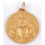 An 18ct gold commemorative medal, the obverse depicting a seated lady with two children at her feet,