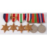 A group of six WW II medals to include 1939-1945 Star, Africa Star with 8th Army clasp, Italy