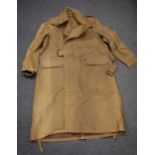 A WW II Coat Rubberproofed (Motor Cyclists), Size 8 and dated 1944 by Leonard Morris & Goldstones